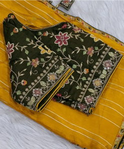 CODE WS880 : Dark fenugreek yellow organza silk saree, pallu with fancy tassels, dark olive green readymade blouse(( height : 15 inches , width : 20 inches , fits upto size 40 , L Size ,can be altered to smaller sizes)DRY CLEAN RECOMMENED